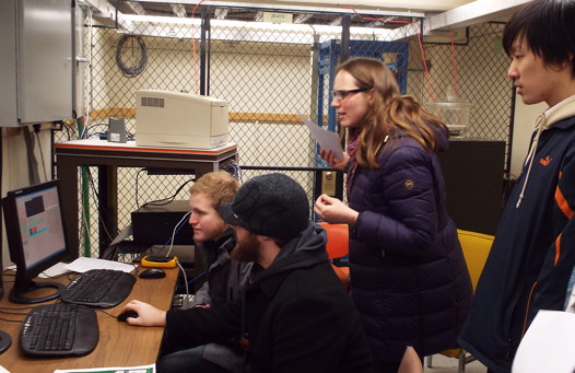 Students observing with the telescope